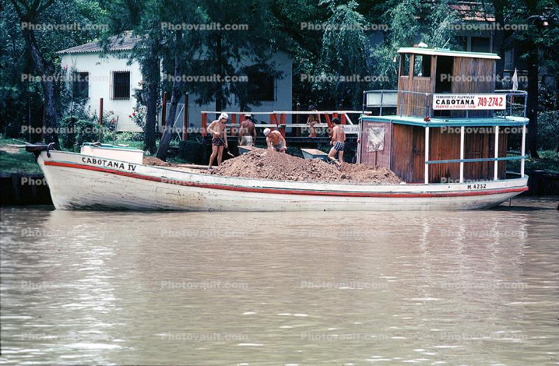 Cabotana IV, muddy river