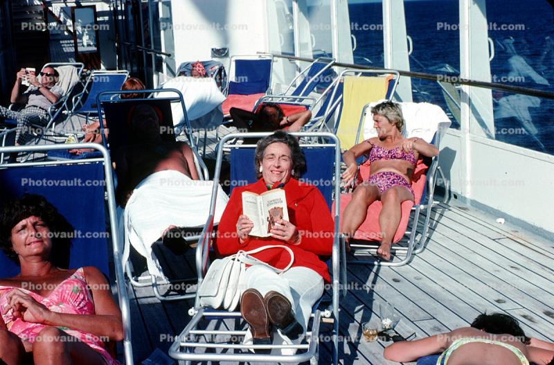 Ladies relaxing on lounge chairs