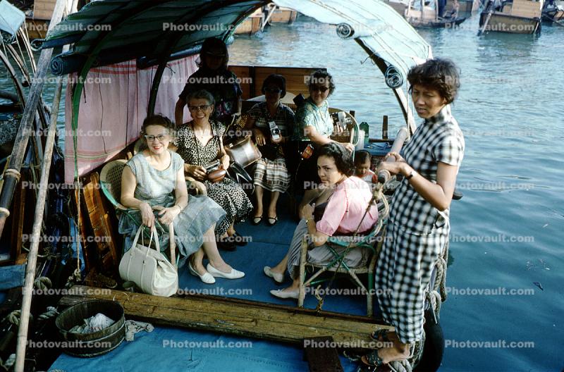 Women, purse, boat, cateye glasses, Macau, China, 1960s