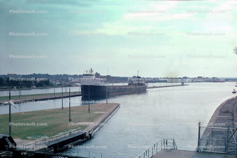 Canal, Freighter entering Soo Locks, Lake Superior to the lower Great Lakes, Sault Ste. Marie, Michigan, June 1976, 1970s