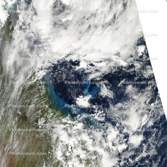 Sediment remained suspended in the waters off the Queensland coast of Australia in the wake of Tropical Cyclone Yasi. 