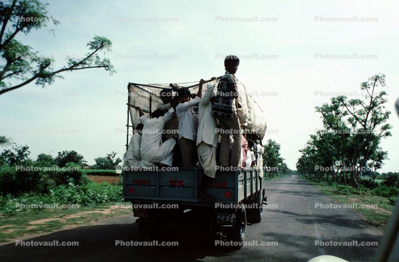 Overloaded Truck, people, street, highway, Bayad Taluka, Gujarat