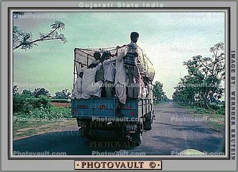 Overloaded Truck, people, street, highway, Bayad Taluka, Gujarat