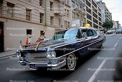 Cadillac, long horns hood ornament