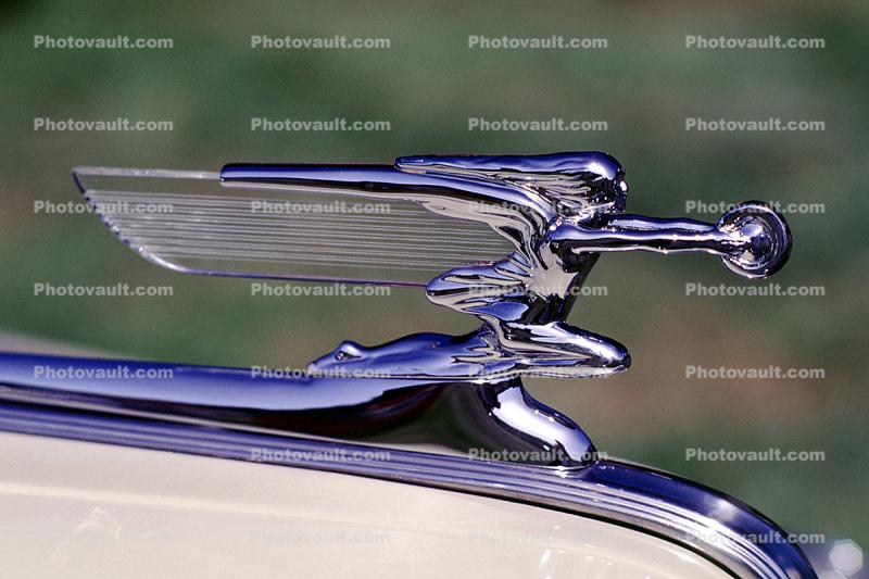 Packard, Hood Ornament, Goddess of Speed, Woman with Wings, holding a tire outstretched in her arms