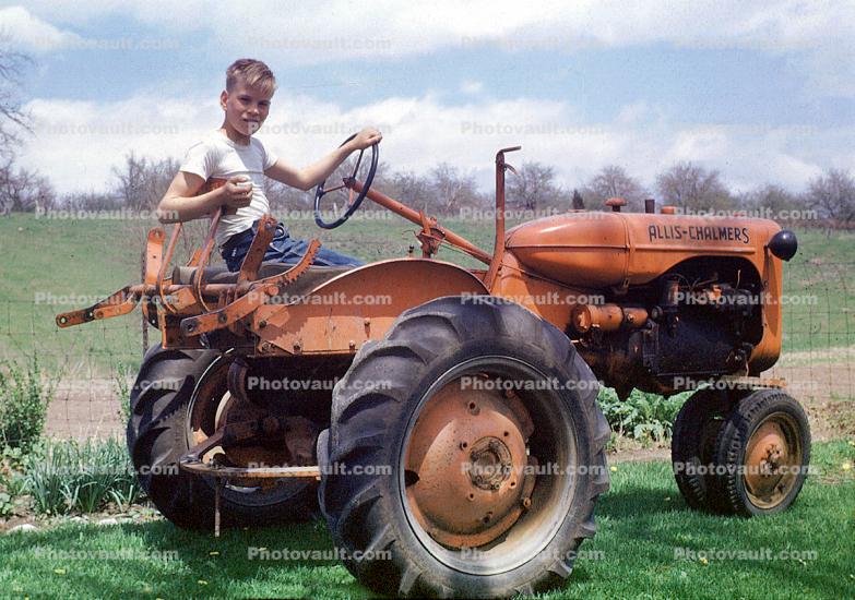 Allis Chalmers Tractor, teen boy, 1950s