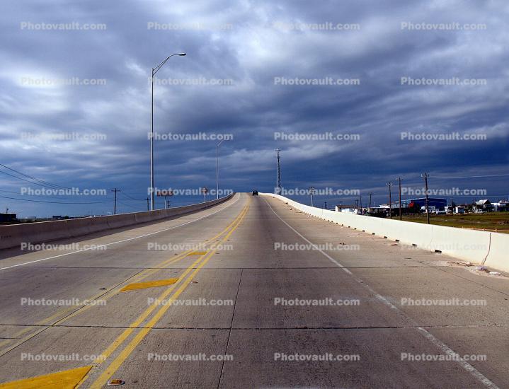Mean Clouds, Road, Roadway, Pavement, Exterior, Outdoors, Outside, southwest of Houston, Texas