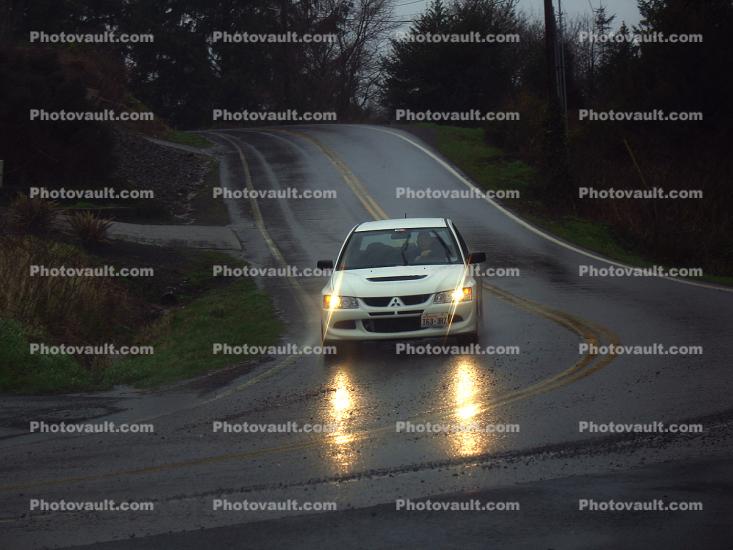 Rain, Wet, Pavement, Street, Road, Roadway, Exterior, Outdoors, Outside, slippery, inclement weather, Rainy, Bad Driving Conditions, Dangerous, Precipitation, car, sedan, Vehicle