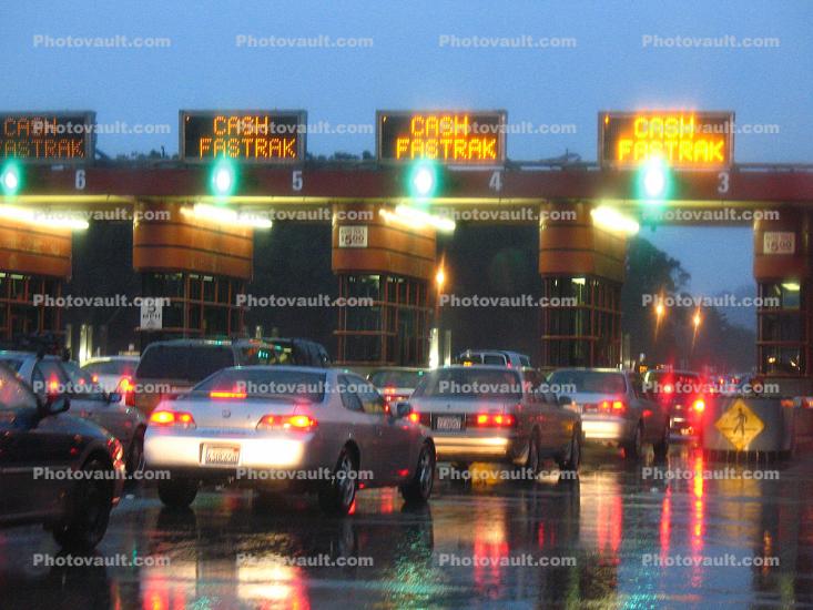 Bay Bridge Toll Plaza on a Rainy Day, Rain, Car, Vehicle, Auto, Road, Roadway, Exterior, Outdoors, Outside, wet, slippery, inclement weather, bad, Rainy, Bad Driving Conditions, Dangerous, Precipitation, sedan, tollbooth