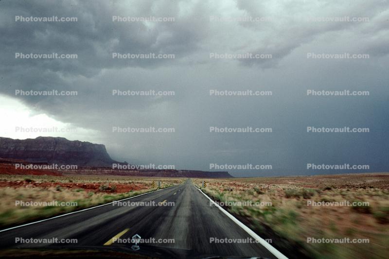Highway-93, Joshua Tree Parkway, Roadway, Road, dark mean gray clouds, rain