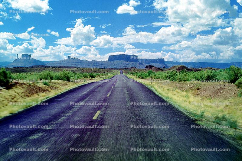 Road, Roadway, Highway 128, Castle Valley, east of Moab Utah, geologic feature, mesa, clouds, butte