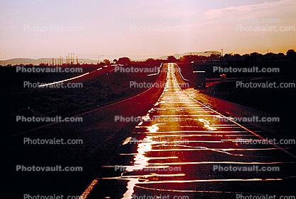 sunset orange, Interstate Highway I-80, near Sacramento, vanishing point