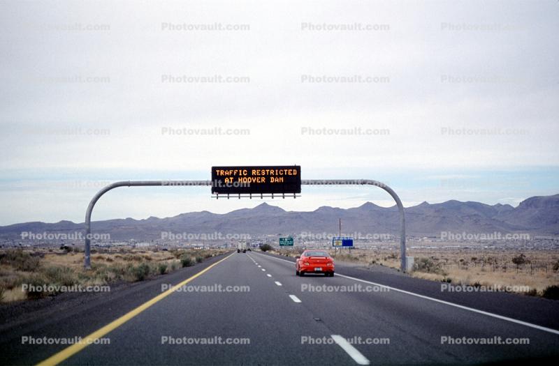Interstate I-10, Road, Roadway, Highway, cars, lit sign, mountains