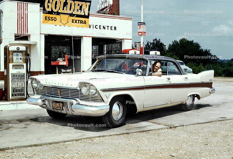 Golden Esso Extra, 1957 Plymouth Belvedere, Garage, Pumps, man, driver, person, automobile, Tail Fins, four-door sedan, car, 1950s