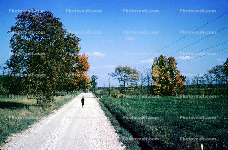 Lone Woman, Dirt Road, Roadway, Gravel, unpaved