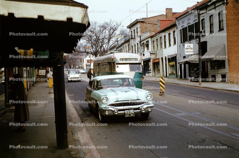Oldsmobile, Sedan, Car, Trolly, DC Transit, buildings, shops, J.C. Chatel Realty, 1950s