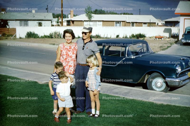 Pontiac Car, family, mother, father, children, suburbia, suburban, 1950s