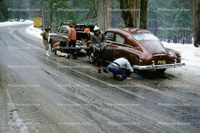 Putting on Chains, Snow, Ice, Highway, road, cars, 1950s