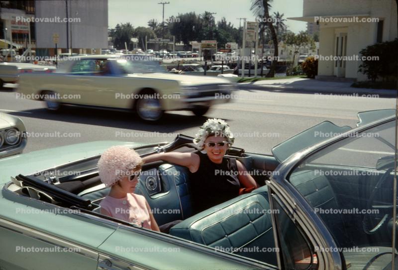 Ladies sitting in a Convertible Chevy, March 1963, 1960s