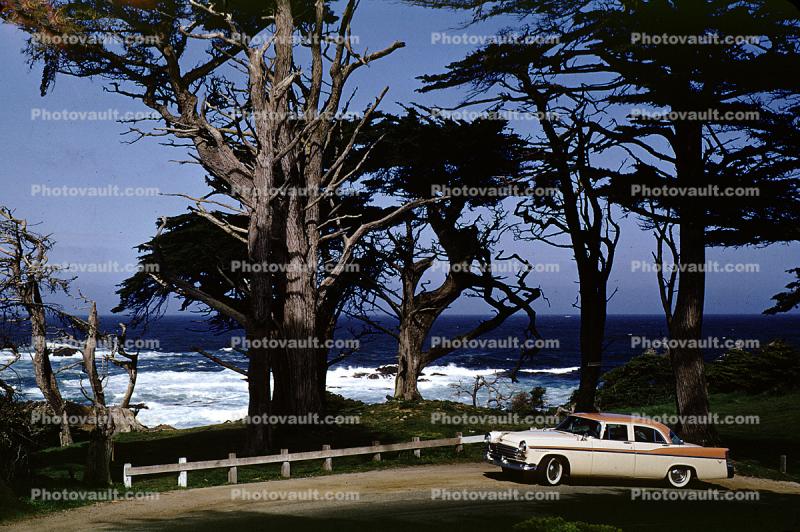 1956 Chrysler New Yorker, coast, coastline, Carmel, Monterey Peninsula, Cypress Trees, Pacific Ocean, California, 1950s
