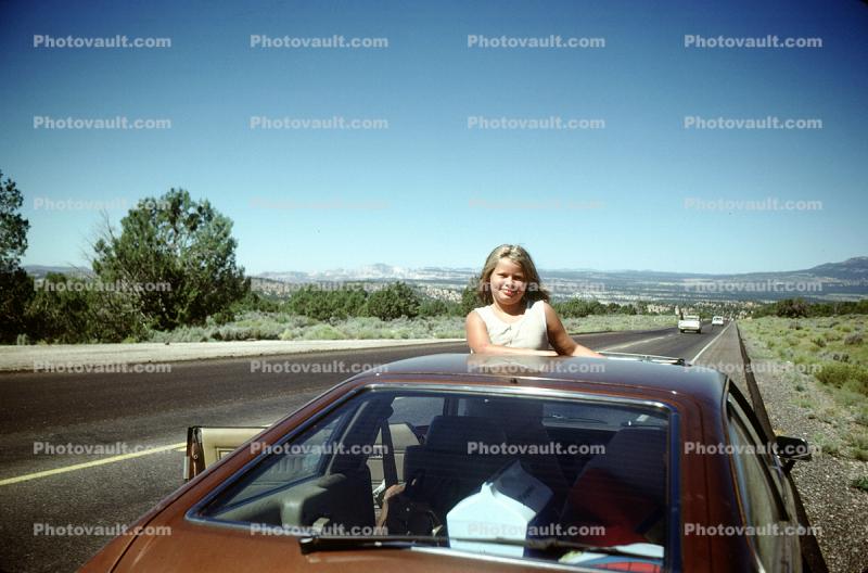 Girl Pops her Head through the Sun Roof, Highway, road, September 1979, 1970s