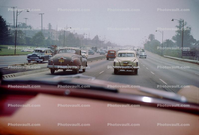 Los Angeles Freeway, cars, Studebaker, smog, 1950s