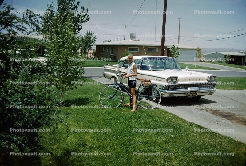 1959 Ford Mercury Monterey, Girl with her Bicycle, suburbia, driveway, 1950s