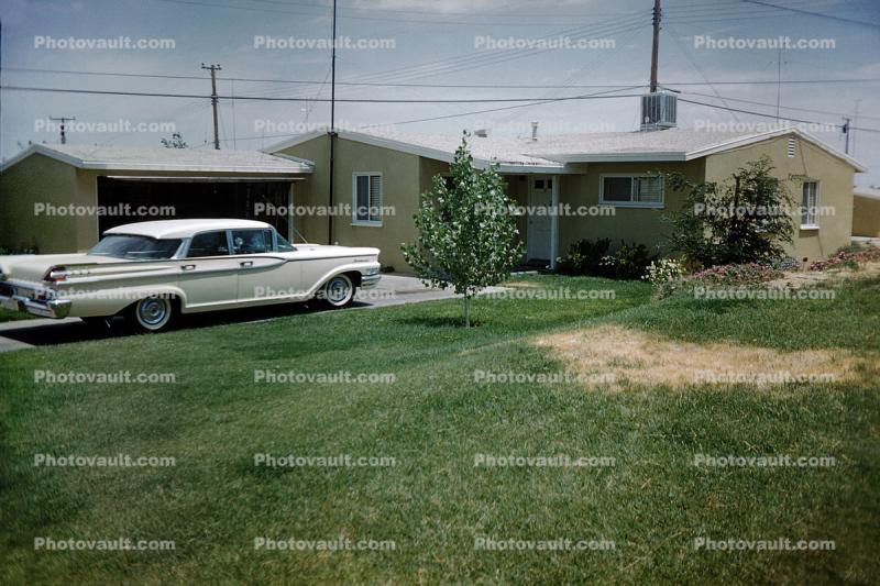 1959 Ford Mercury Monterey, Boy with his Bicycle, suburbia, driveway, 1950s