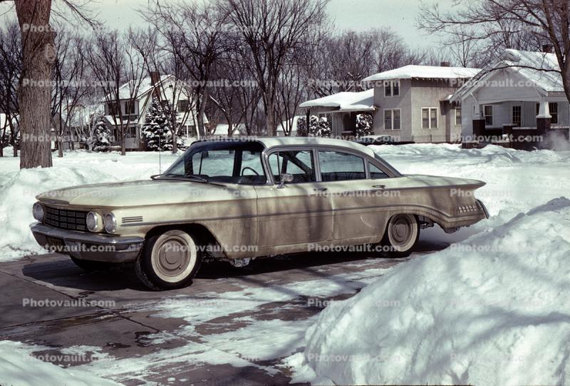 Muddy Buick, snow, ice, cold, winter, 1960s