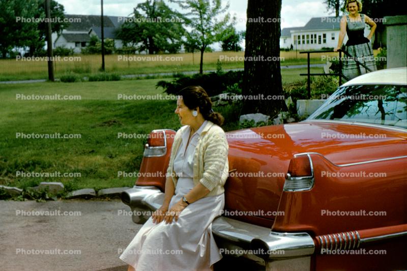 Woman Sitting on a Tail Bumper, Cadillac, 1950s