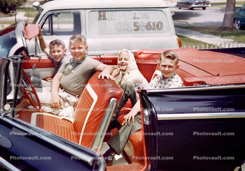 Kids inside a Cabriolet Car, 1950s