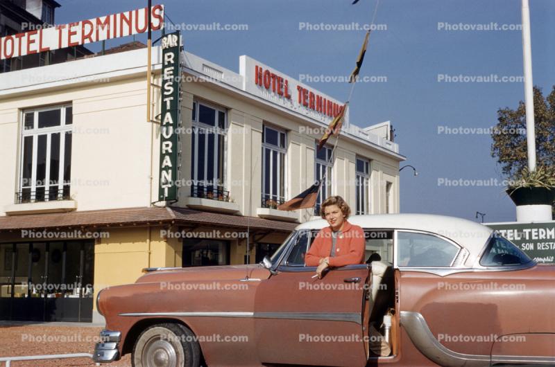 Woman and her Chevy Bel Air, Hotel Terminus, 1950s