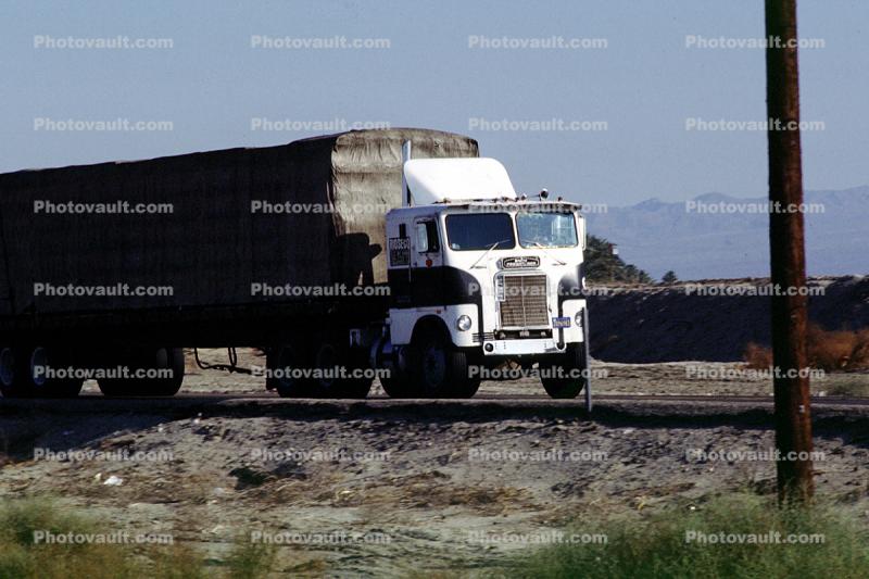 White Freightliner, Salton Sea, flatbed trailer