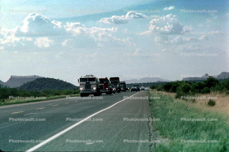 Convoy of Trucks, Clouds, Highway