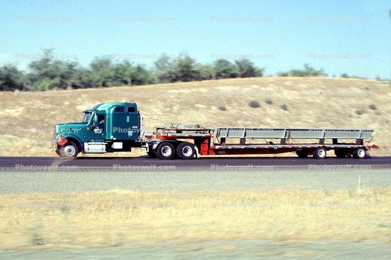 Interstate Highway I-5 near the Grapevine, flatbed trailer