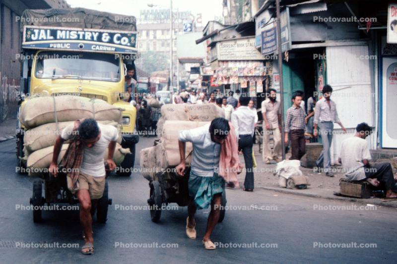 Men pulling carts on the Streets of Mumbai