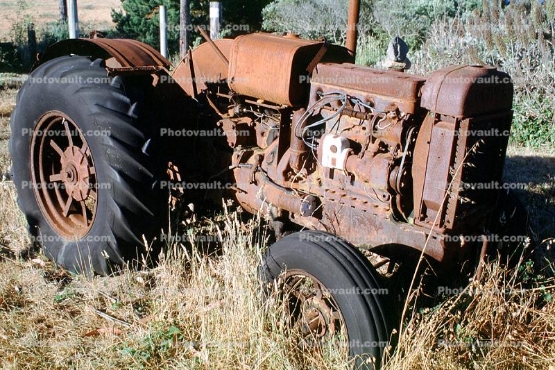 Bolinas, farm tractor rusting, rust