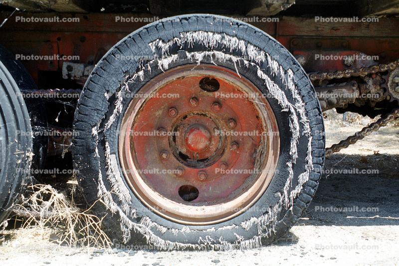Taft, old truck tire and wheel