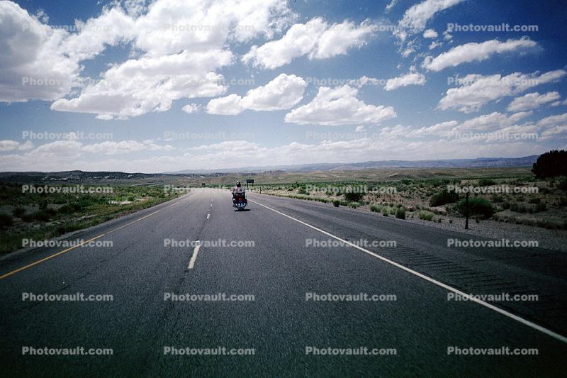 Honda, Man, Woman, Riding, Desert, road, highway, cumulus clouds