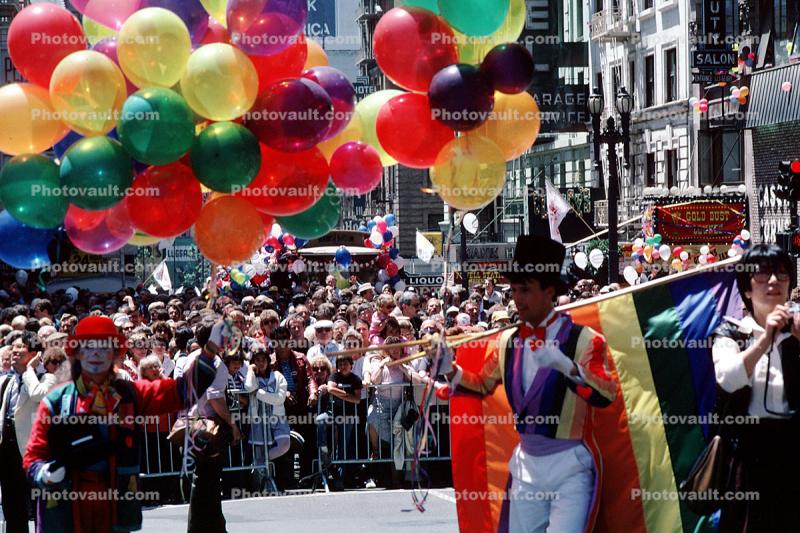 Rainbow Flag, top hat, downtown-SF, clowns, balloons, crowds, Powell Street at Union Square, CC celebration June 21 1984, 1980s