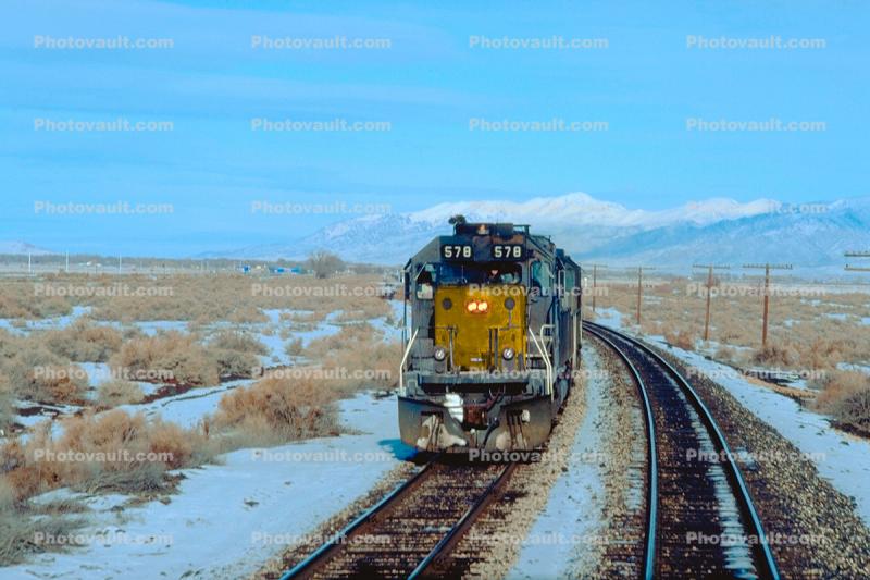 UP 578, Union Pacific, Diesel Locomotive head-on, Creosote bush, shrub, plant, Snow, Ice, Cold, Cool, Frozen, Icy, Winter