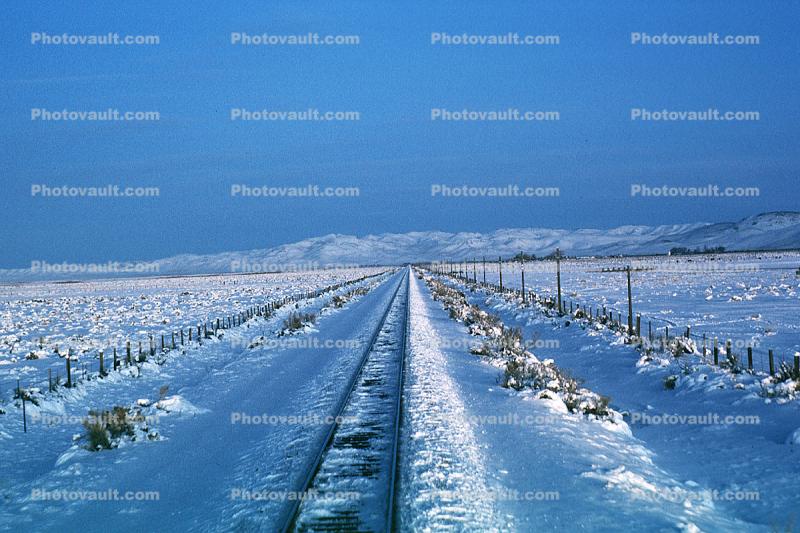 Railroad Tracks in the Snow, Brush, Shrub, Ice, Cold, Cool, Frozen, Icy, Winter, hills, mountains