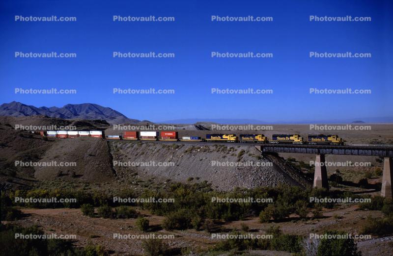 ATSF, Santa-Fe freight crosses Bridge 874.2 at the west end of Abo Canyon east of Sais, New Mexico, October 1995