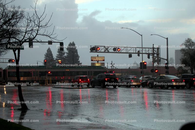 Evening Rain Railroad Crossing, cars, East Washington Street, Petaluma