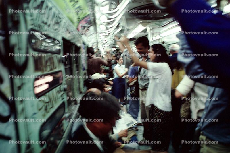 Crowded Train, subway, Railcar Interior, people, commuters, underground, June 1980, NYCTA, 1980s