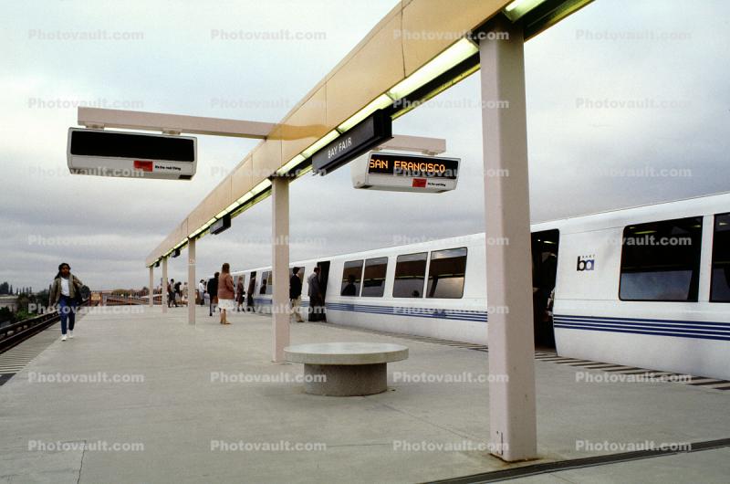 Passengers boarding a BART train, Bay Area Rapid Transit, platform, station