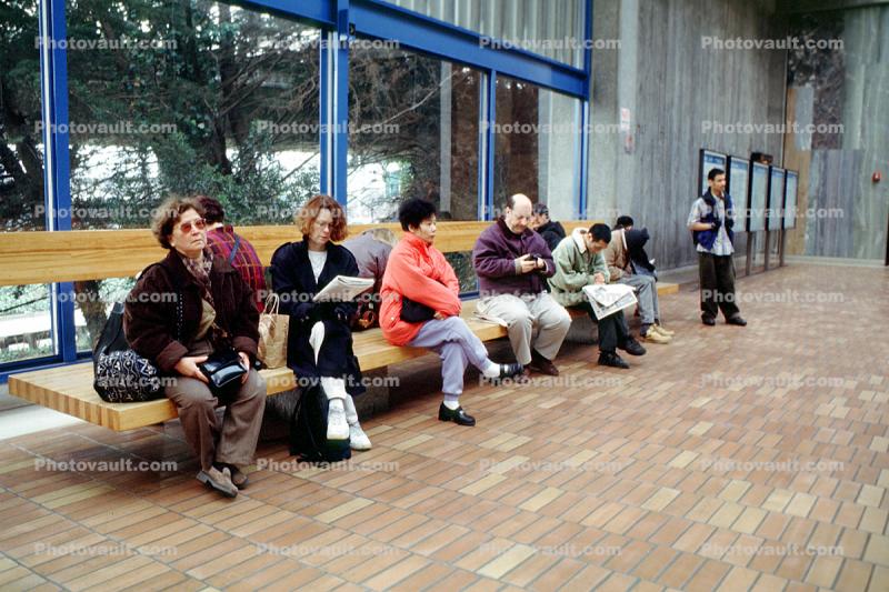 BART station, Passengers Waiting for BART, Sitting, Bench, commuters