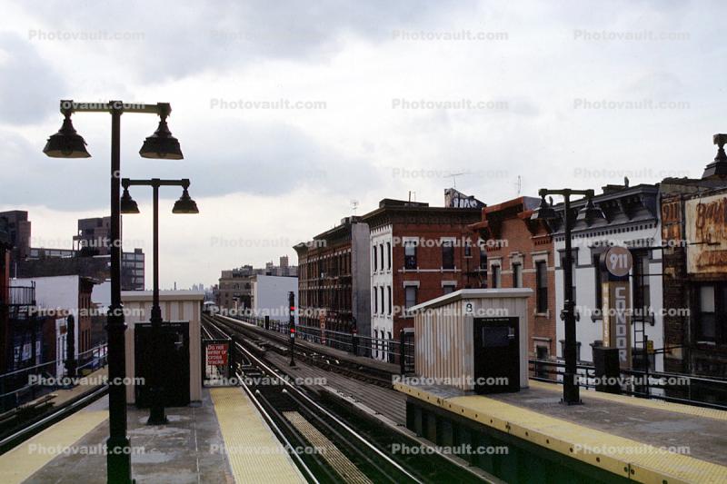 Station Platform, tracks, homes, buildings, NYCTA