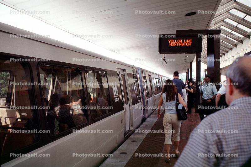 Metro passengers, woman, man, train