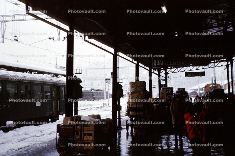 People at a Train Station, Depot, Railcar, Brig, Switzerland, 1950s